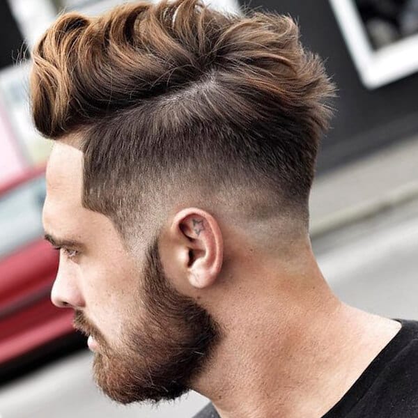 Pompadour-inspired undercut hairstyle for men