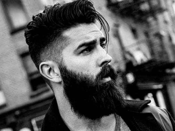 Hipster man haircut with beard
