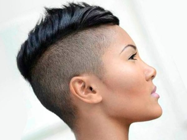 An Asian female with short Mohawk hairstyle.