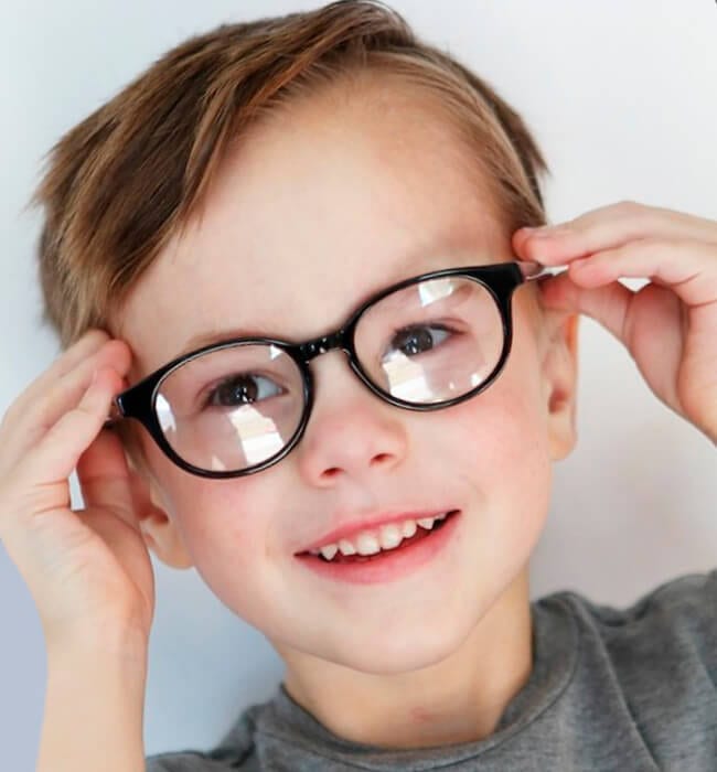 Sporty haircut for boys with glasses