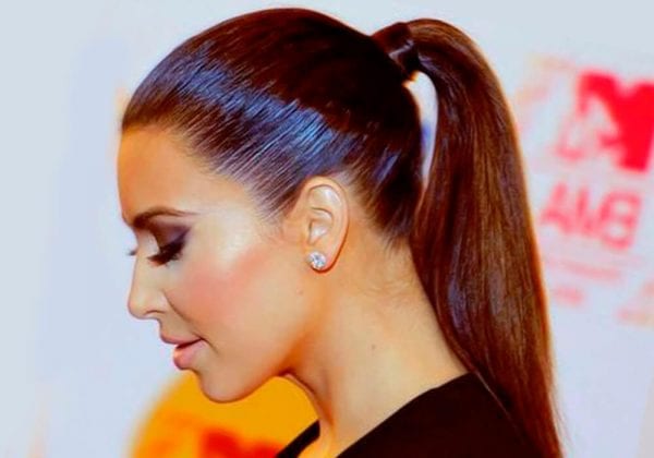 A chick with a sleek straight ponytail.