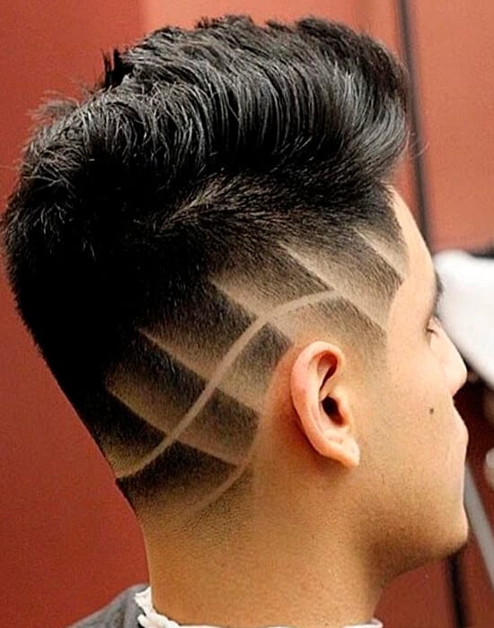 Fade cool haircut with shaved design
