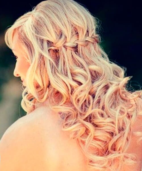 Waterfall braid with curls half up half down formal hairstyle