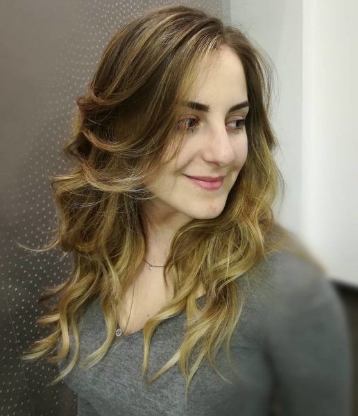 dirty blonde hair with wavy highlights
