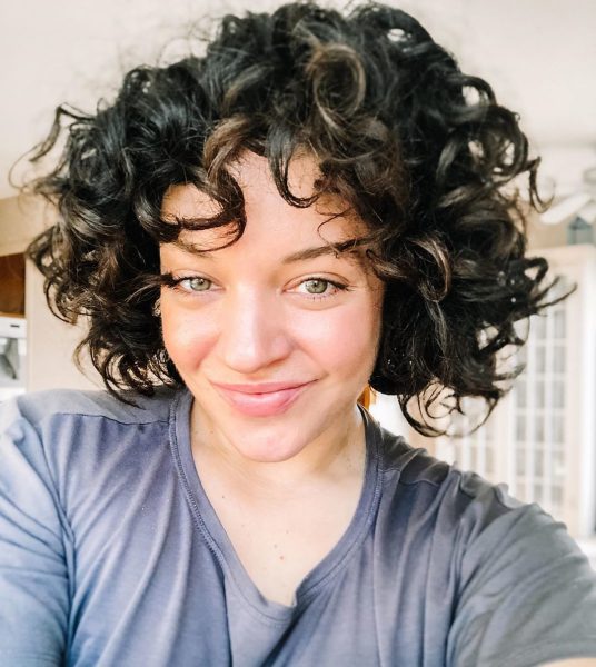 middle-length hair with curly bangs