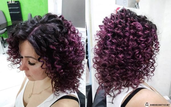 natural black hair with curly purple highlights