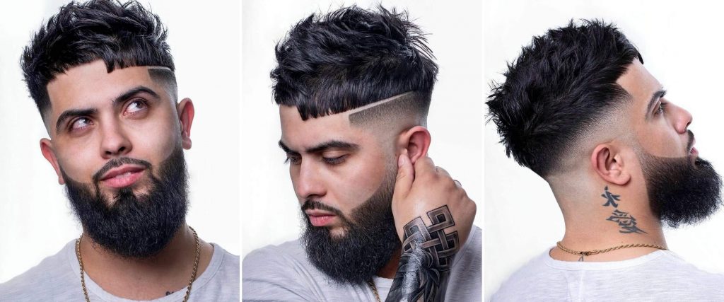 Disconnected Undercut Hair with an Acute Angled Fringe and a Beard