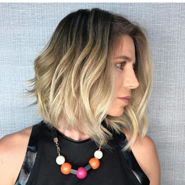 Short Wavy Hairstyle of Beautiful Ash Blonde Color