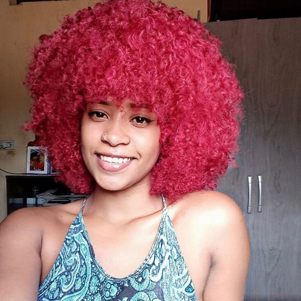 Shoulder-Length African American Hairstyle with Pink Curls