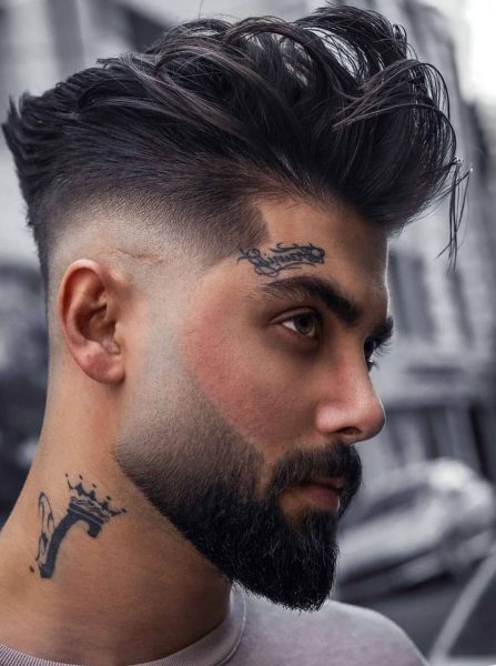 Slicked Back Hair with Fade Haircut and Thick Beard