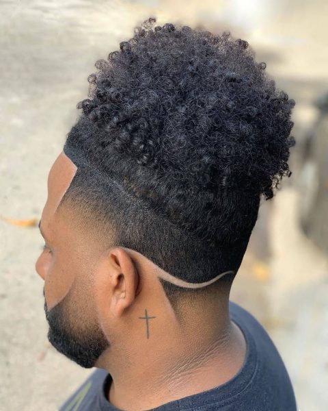 Black Men Curly Top Hairstyle with Wavy Line