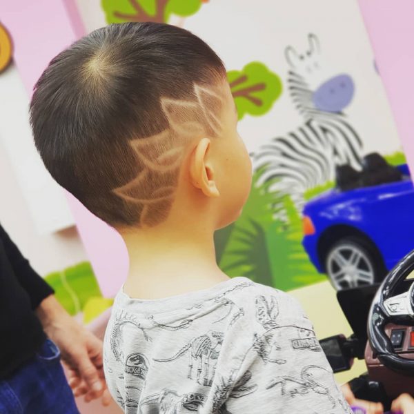 Cute Toddler Boy Haircut with Petal Design