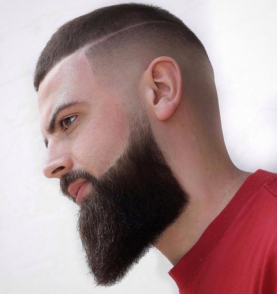 Disconnected Undercut Haircut with Skin Fade and Full Beard