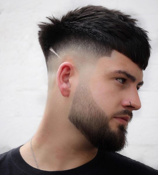 Messy Undercut Hairstyle for Men with Beard