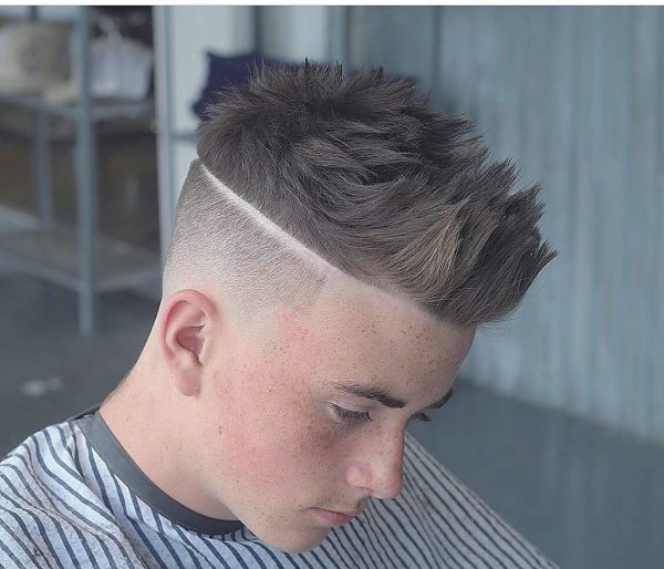 High Taper Fade Hairstyle for Guys with Spiky Top Hair
