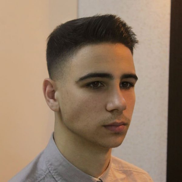 Taper Fade + Fohawk Hairstyle for Young Men