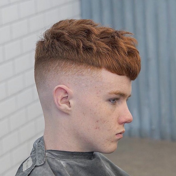 A hairstyle with a faded transition for little boys.