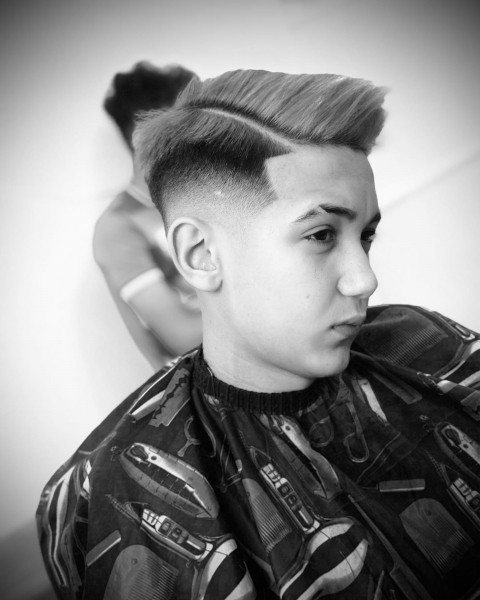 A middle-faded haircut for boys.