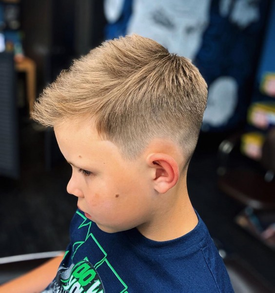 A fade haircut for little boys.