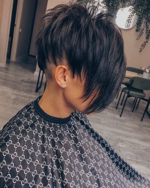 A pixie hair cut with elongated texture.