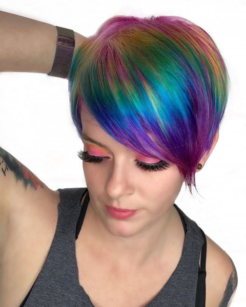 A long choppy pixie hairstyle for rainbow haired girls.
