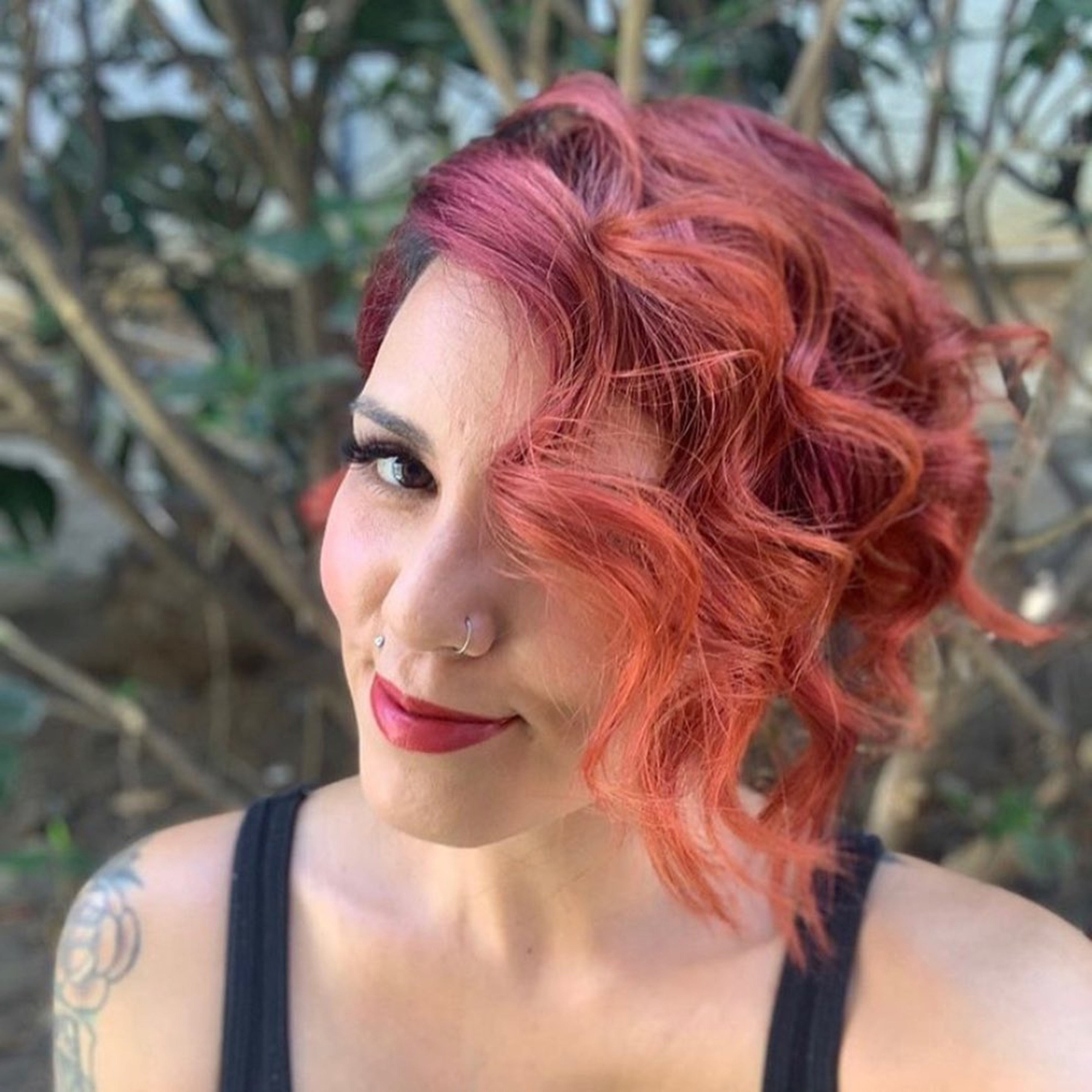 A long pixie haircut for curly hair.