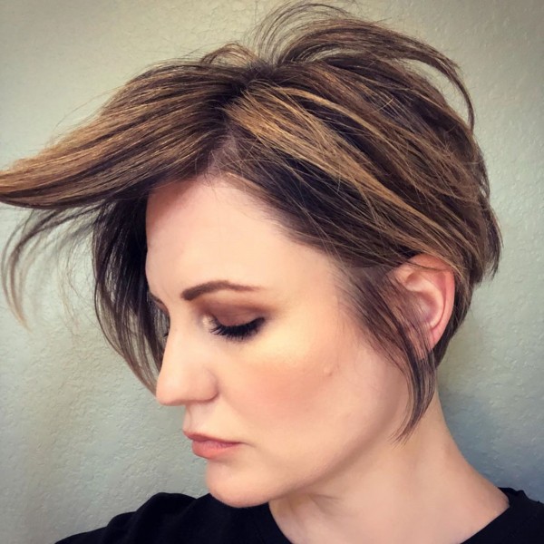 A long messy pixie haircut for independent women.