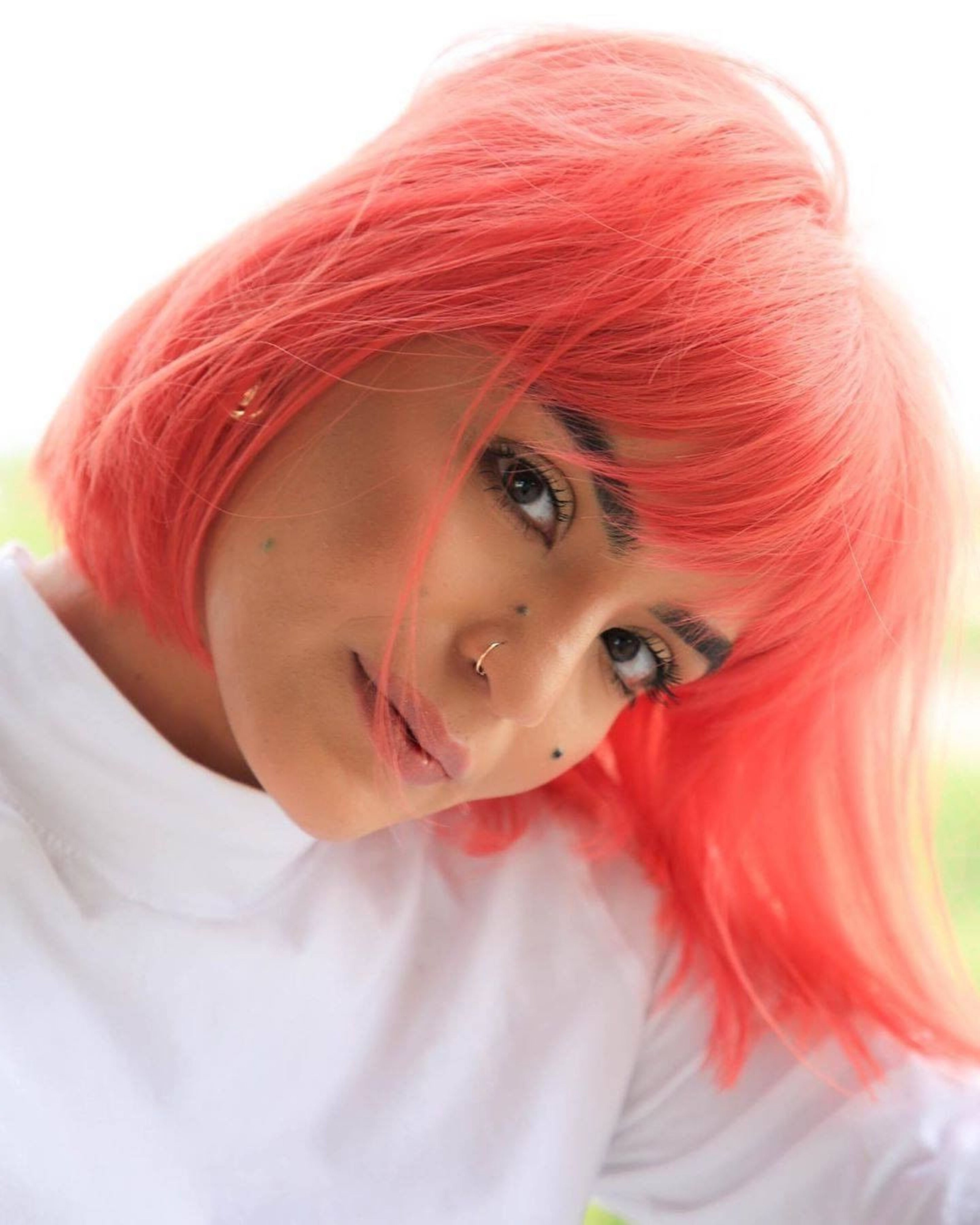 A long pixie haircut for red-haired girls.