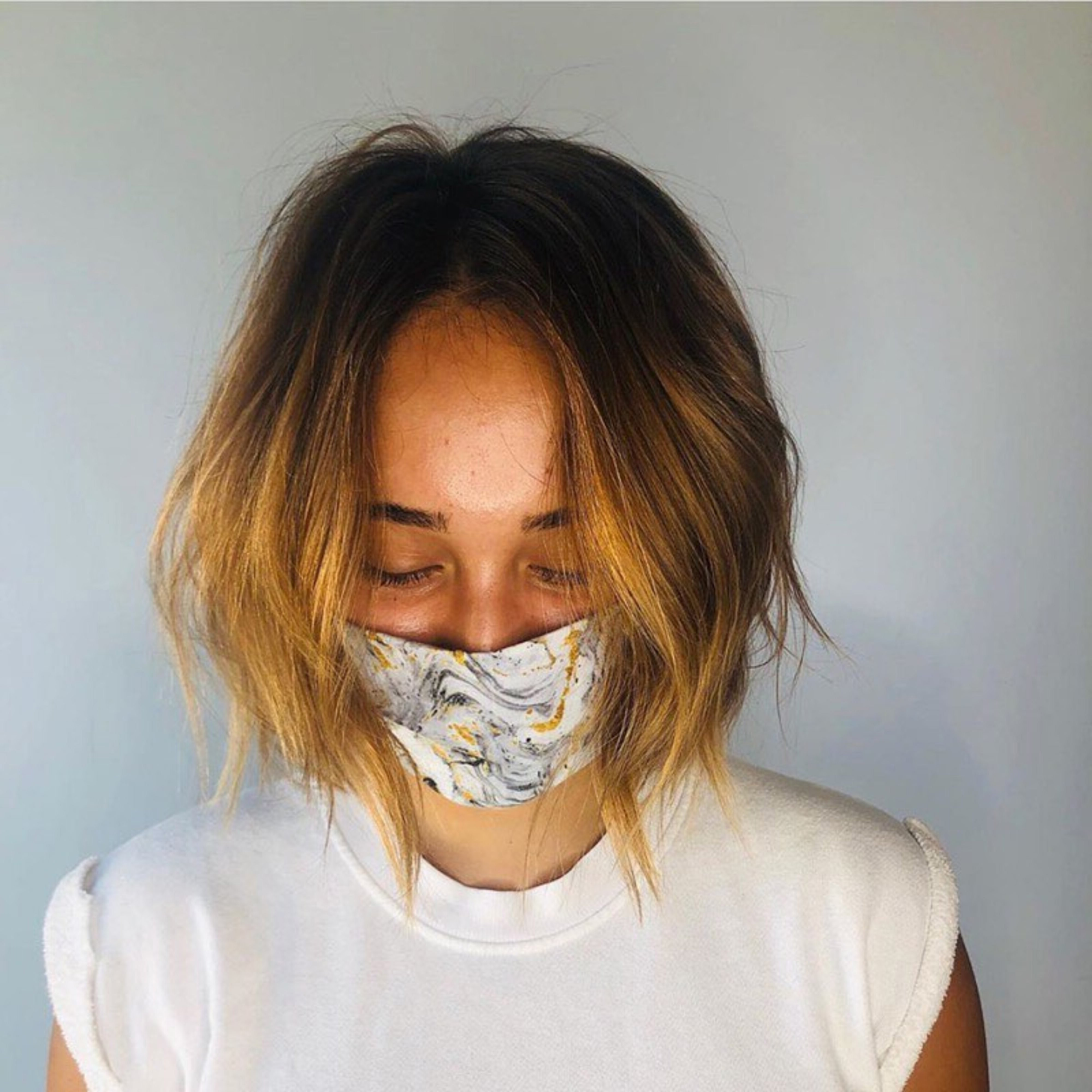 A long stacked pixie haircut for trendy girls.