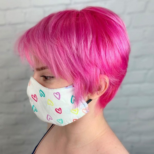 A lovely pink pixie hair cut.