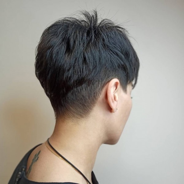 A short pixie haircut with layers.