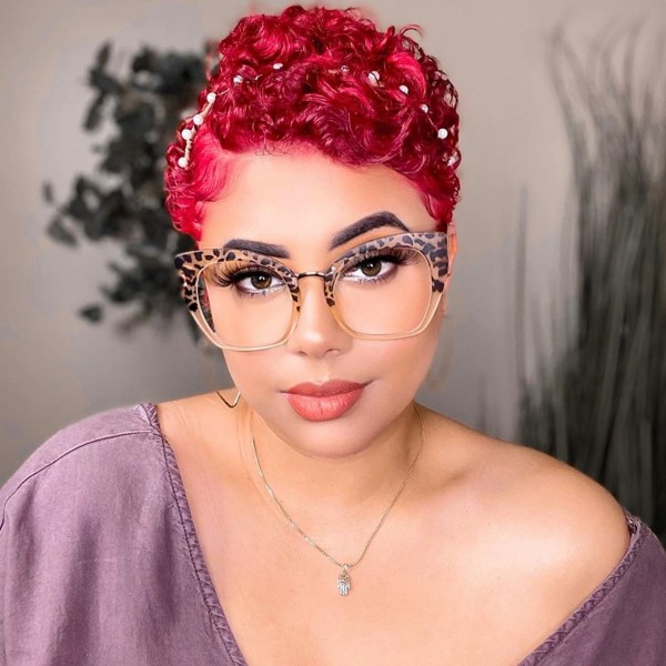 A pixie hair cut with glasses.