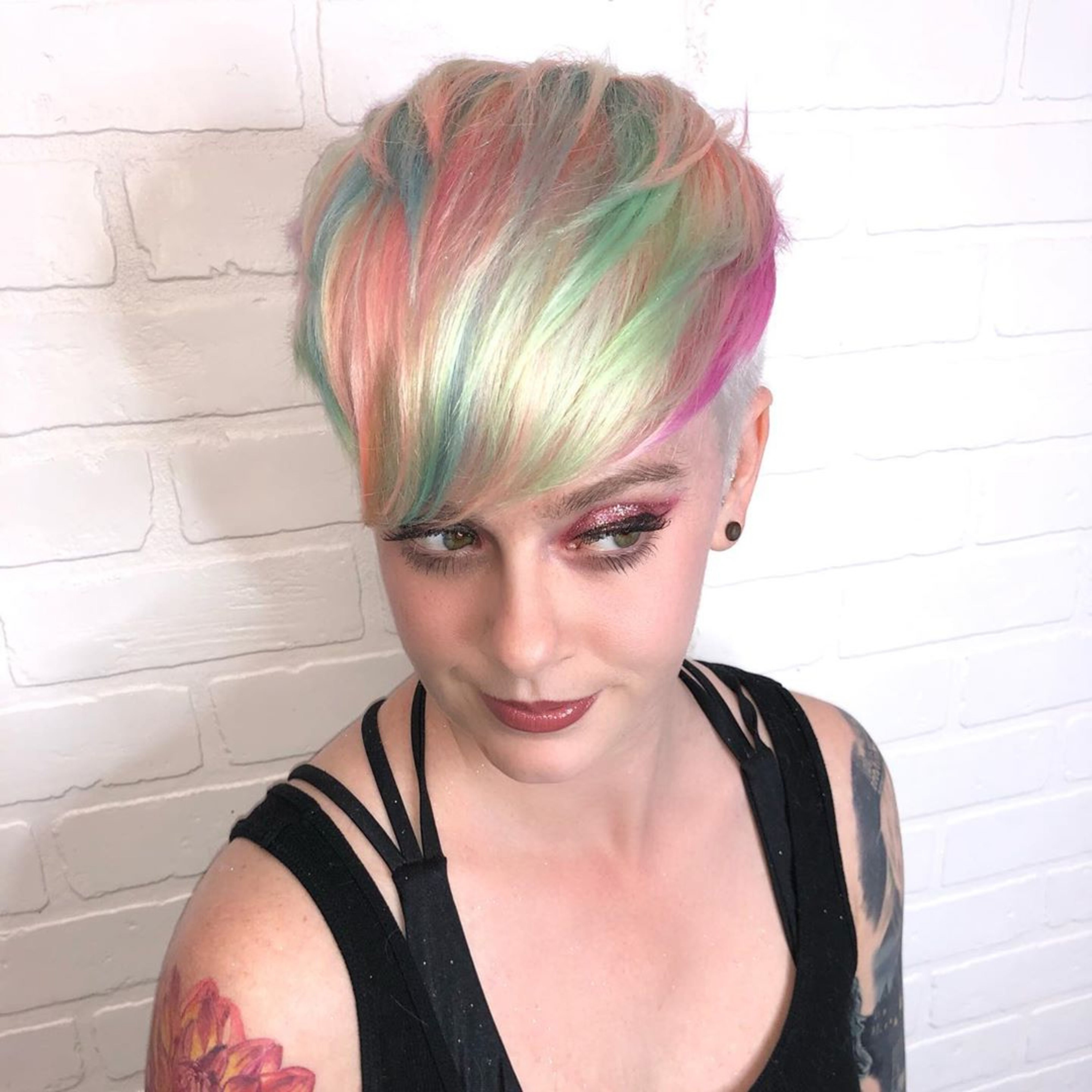 A tapered pixie with long bangs for your versatile look.