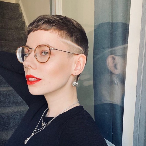An ultra-short pixie hair cut for young ladies.