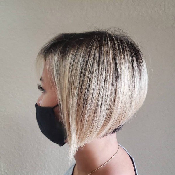A nice bob with dark roots.