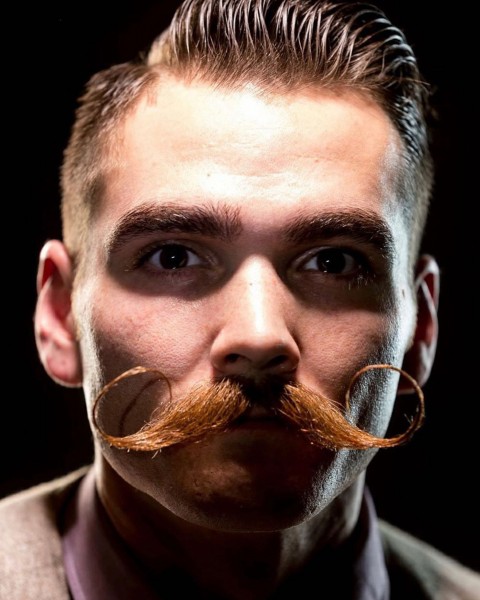 Emilio handlebar mustache for self-confident men.