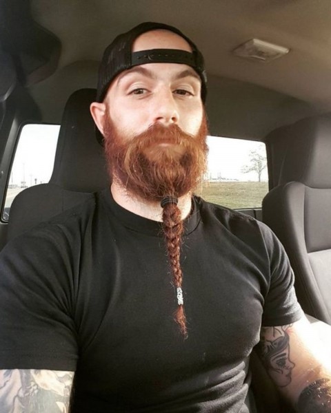 A long beard with braids.