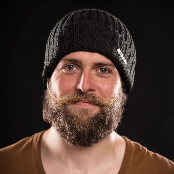 A short beard in the lumberjack style.