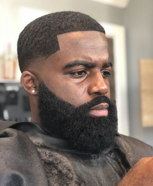 A black man beard in a lace front style.