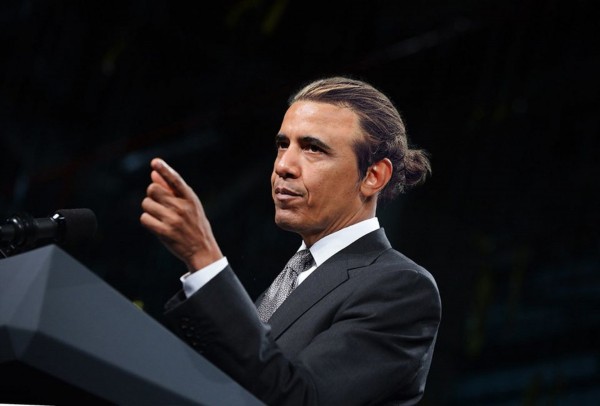 Barack Obama with a casual bun style.