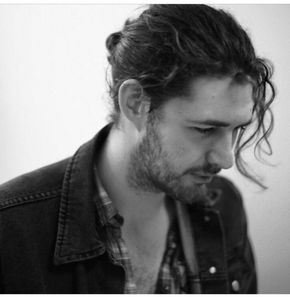 Hozier and his male bun look.
