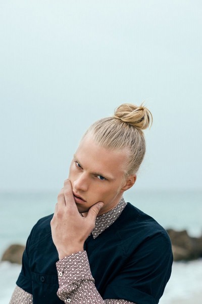 A bun hairstyle for blonde males.