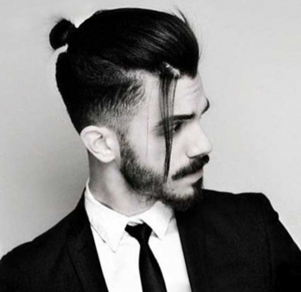 A stylish male bun for formal occasions.