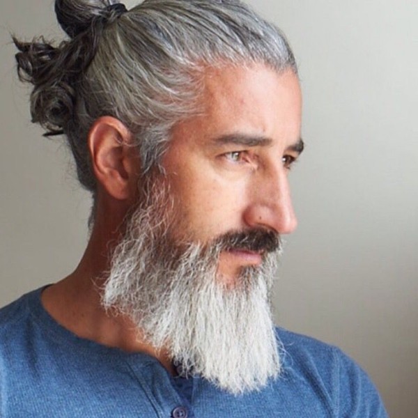 A bun haircut for grey haired men.