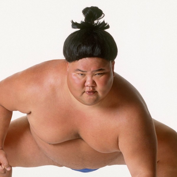 A man bun in the Sumo style.
